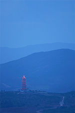 A giant pagoda after sun set in Chuxiong